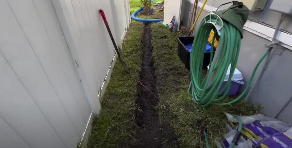 Excavated soil, preparing for pipe installation
